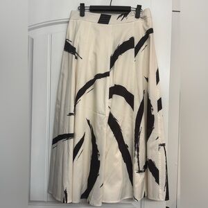 Elegant Black and White midi Skirt (no brand or size tags)